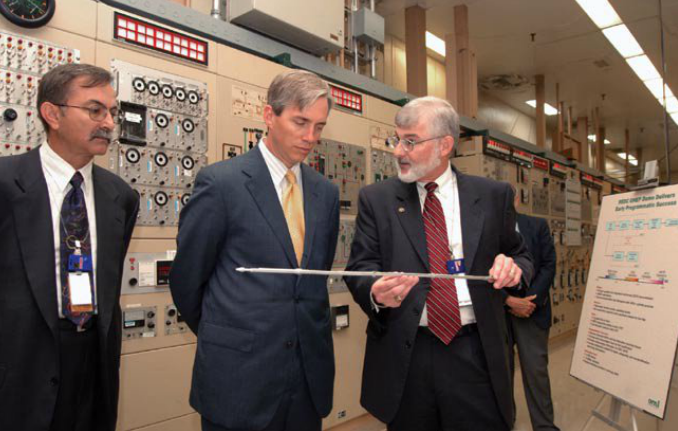 Deputy Secretary Sell (center) revives an explanation of GNEP-related nuclear energy technologies during a visit in June 2006 to the Oak Ridge National Lab's Radiochemical Engineering Development Center. 