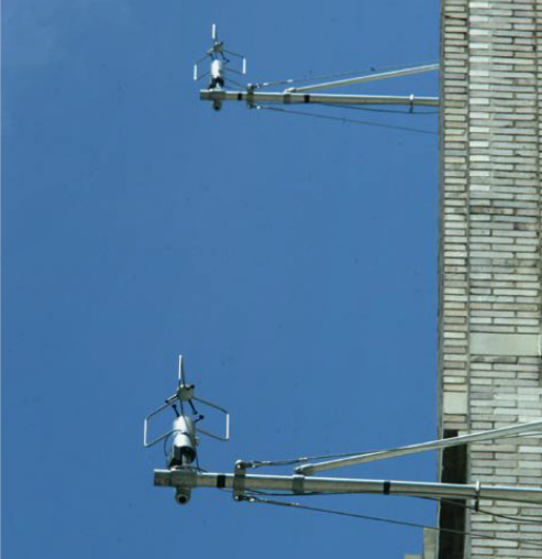 Sensors used to track biological, chemical and radiological agents sit on the side of a U.S. Post office building in New York City in June 2003.
